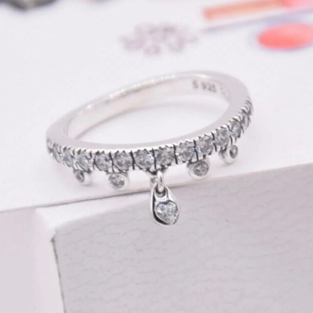 Elegant Silver Ring with Dangle Charm